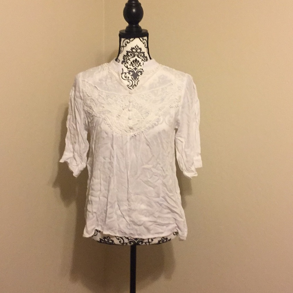 Cute top with lots of detail